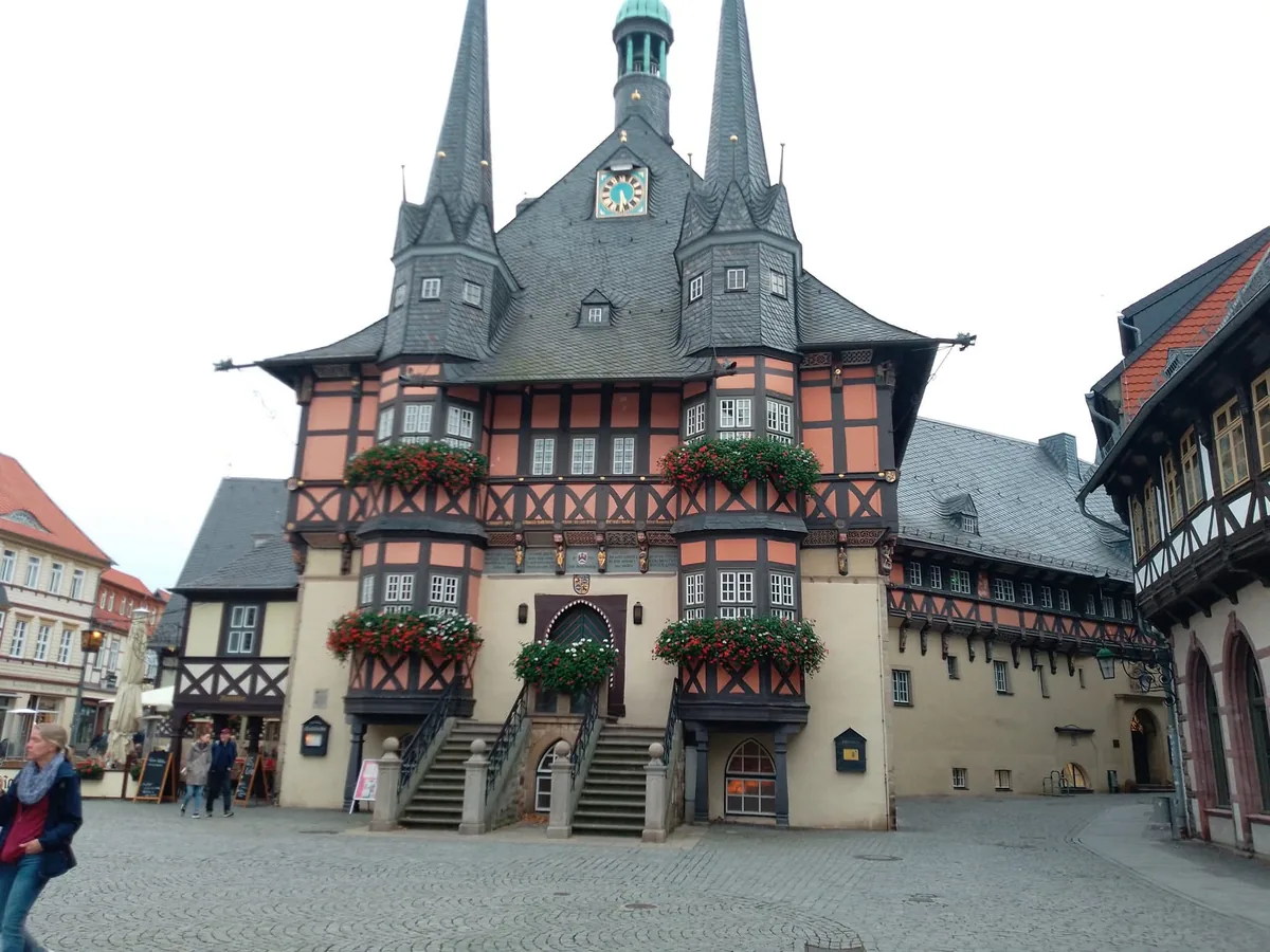 The half-timbered Rathaus (town hall) in Wernigerode, in Germany's Harz mountains, with its twin spires and flower-box balconies